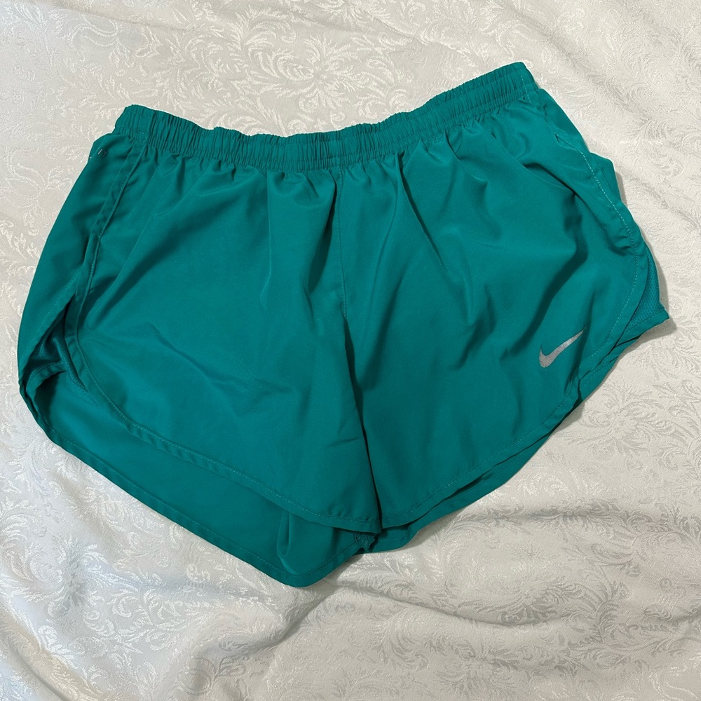 Nike turquoise running shorts